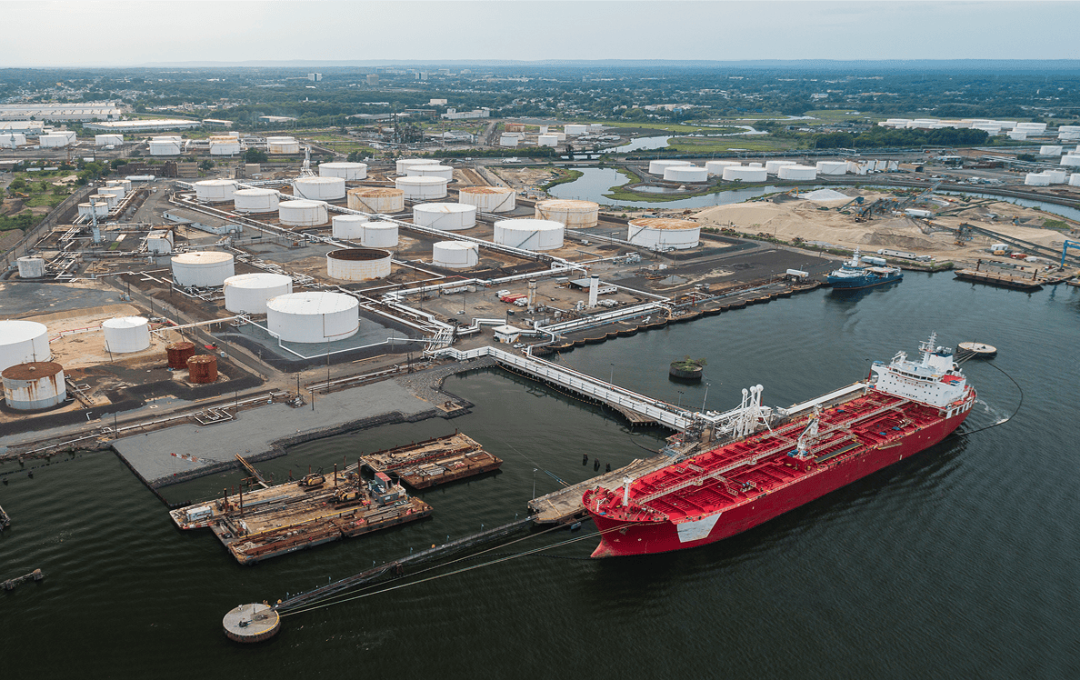 Aerial view of red oil tanker at terminal