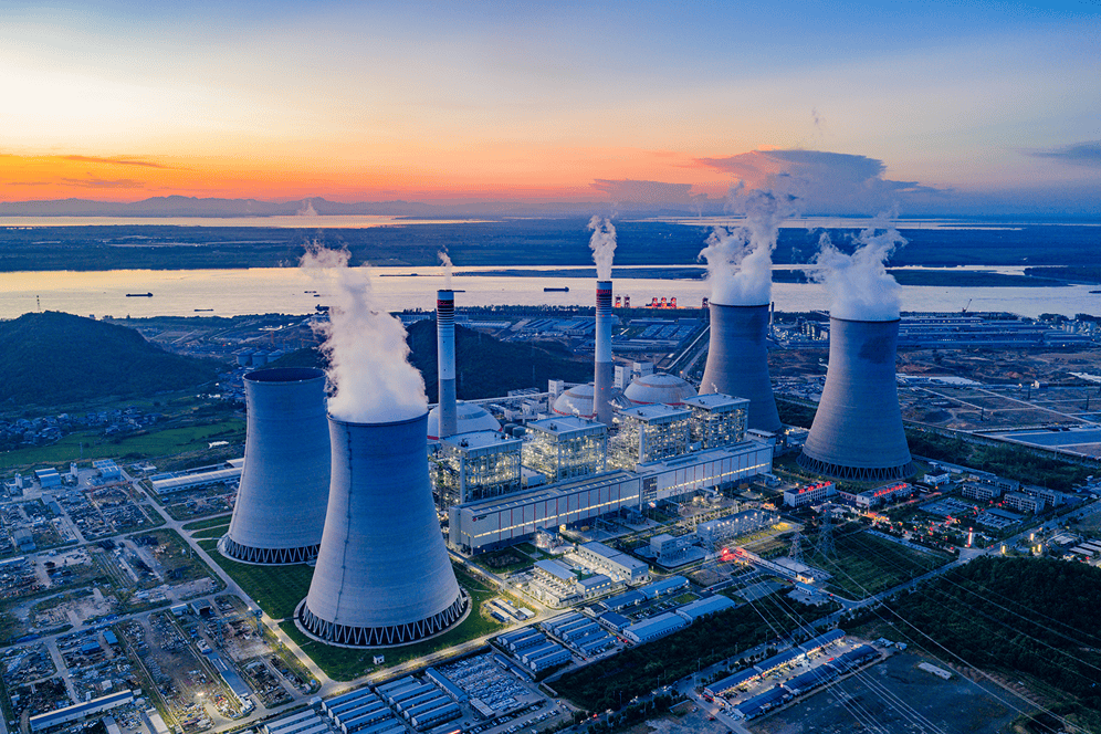 Aerial view of power plant with cooling towers